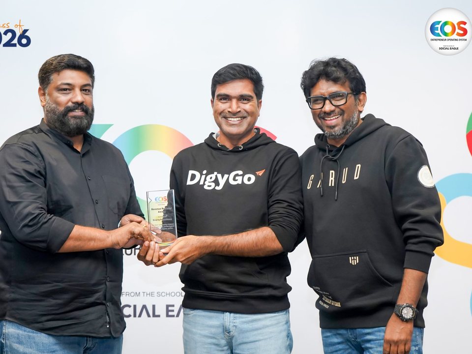 Sivaraj Palanisamy receiving the Revenue Rockstar Award at the Entrepreneur Operating System, Class of 2026